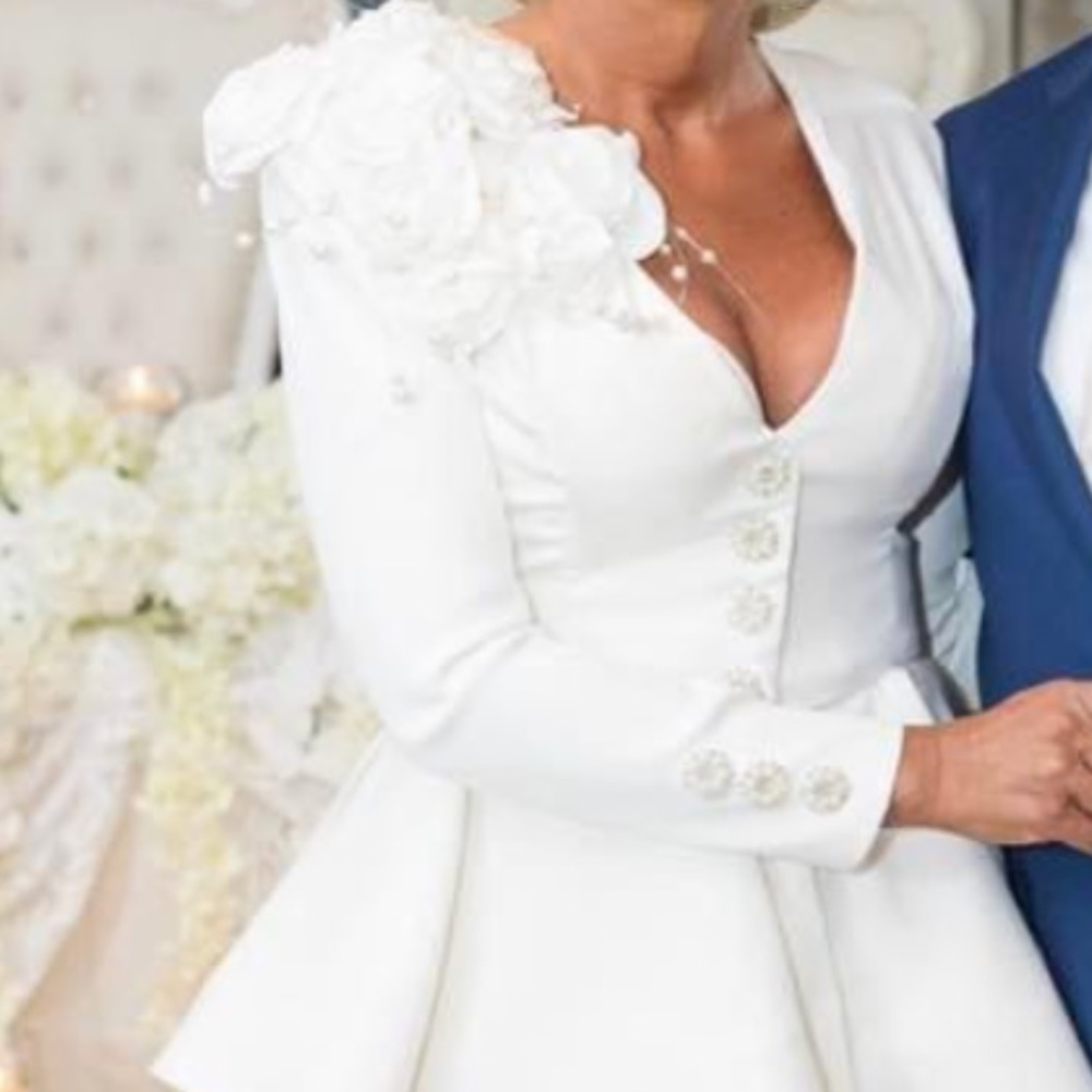 Designer mother of the bride outfit and headpiece